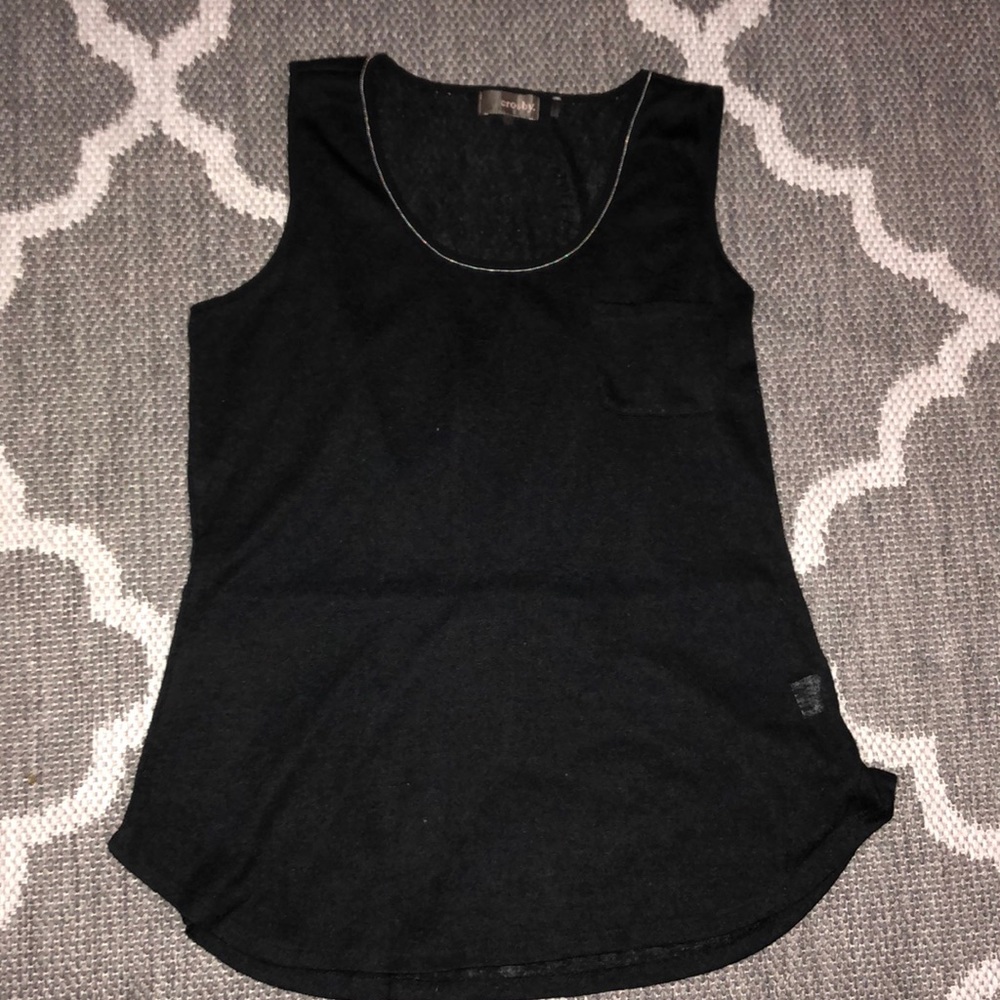 Black no sleeves top with pledges on the back